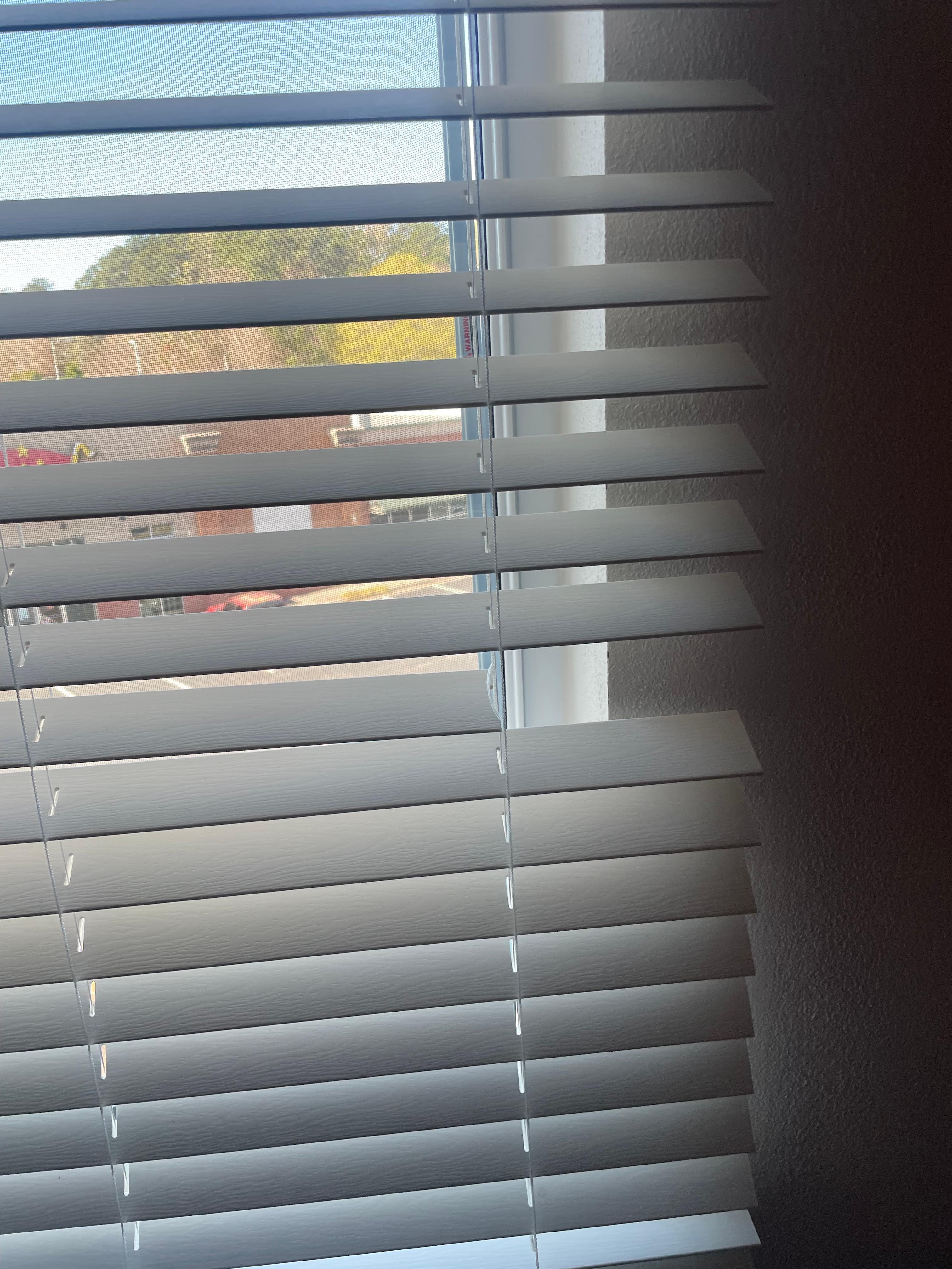 The window blind that was broken.