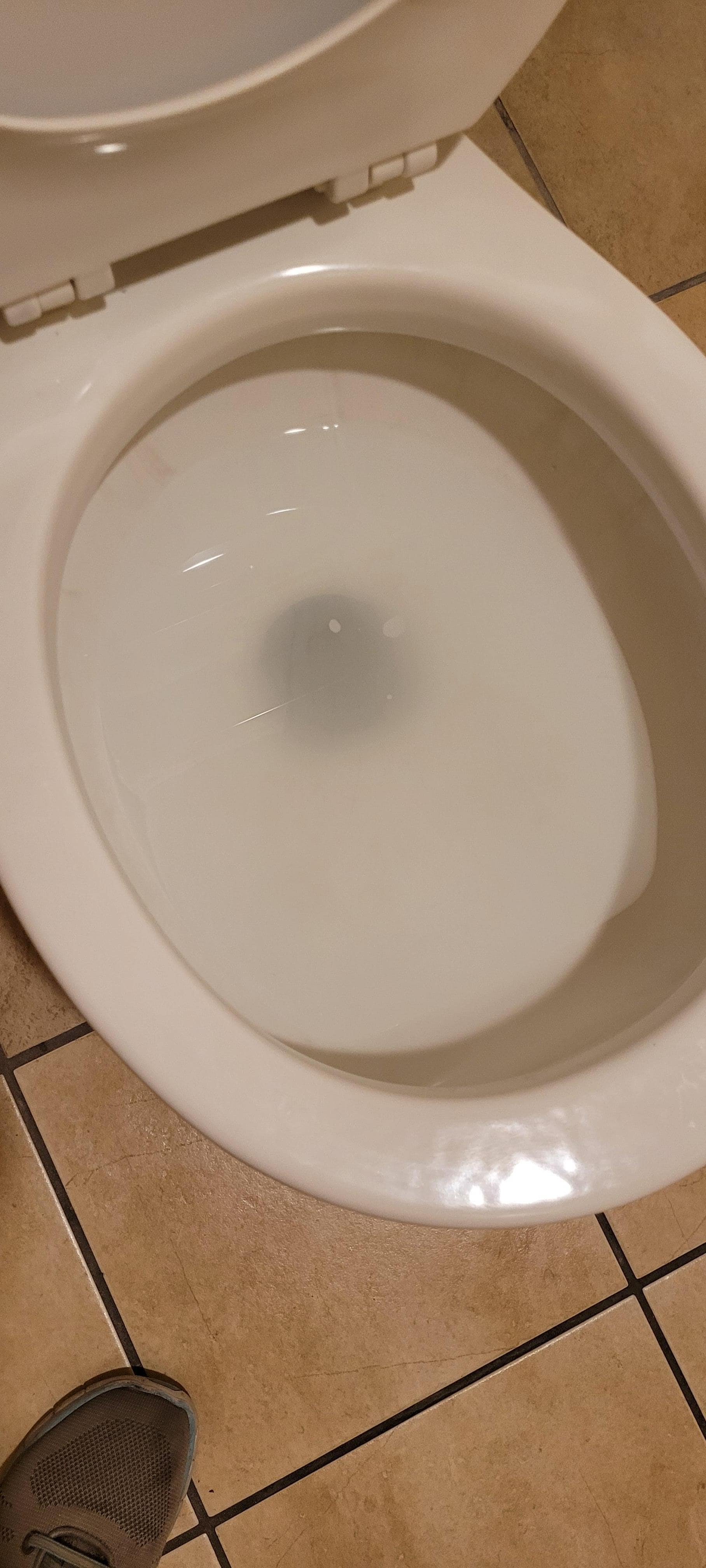 Very cloudy/dirty water sitting in commode on arrival.