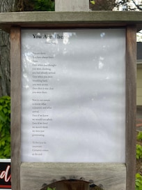 Poem displayed in neighborhood yardâš