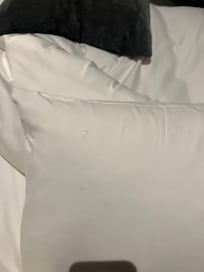 Hole and marks on pillow