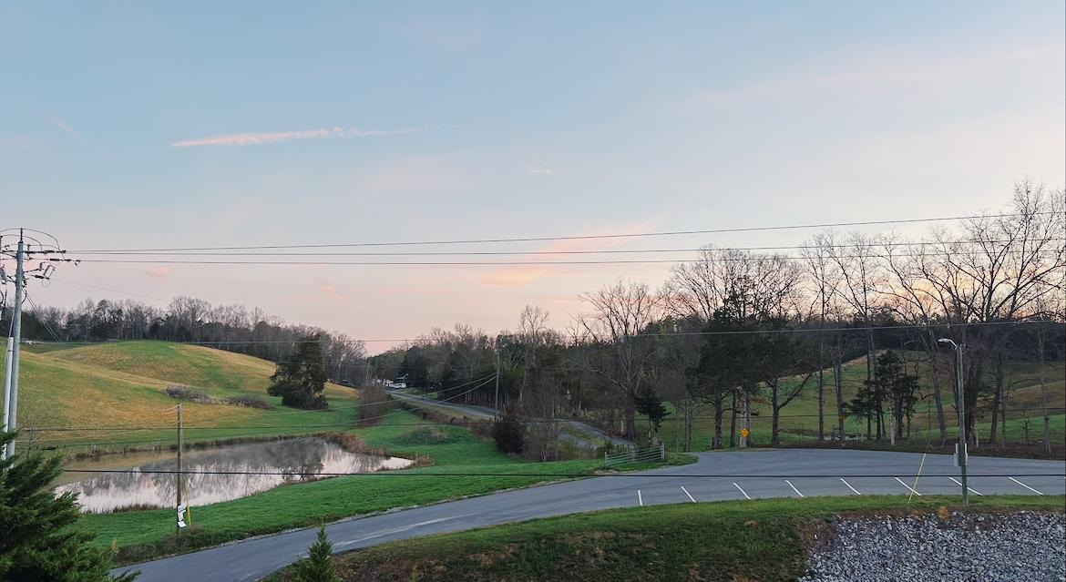 Our view in the morning from the front porch. Watching the deer on the top of the hill.