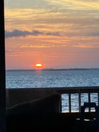 Sun rise from the screened in porch