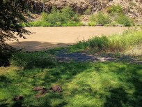 Private Beach and small boat launch.