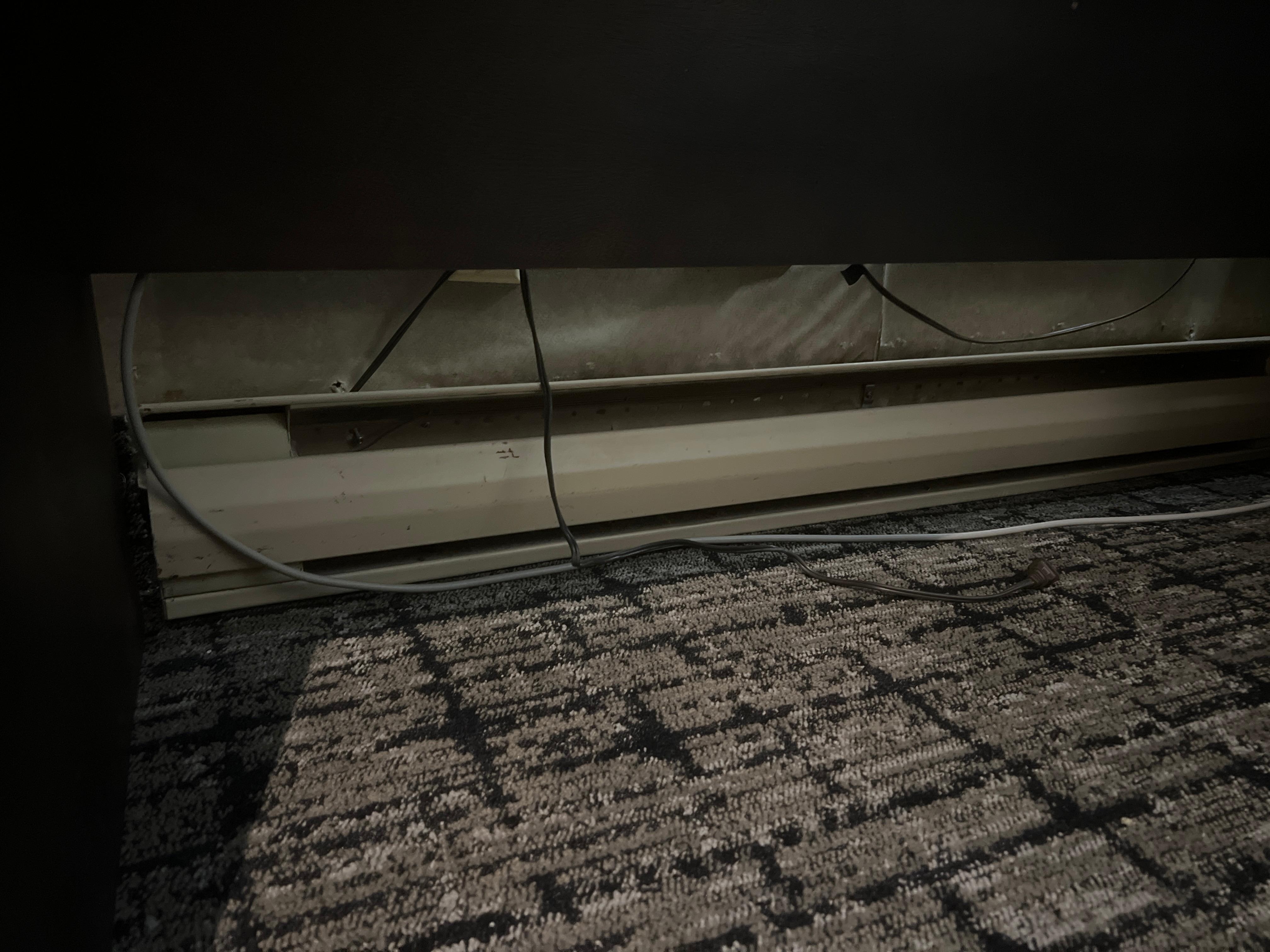 Underneath the study desk