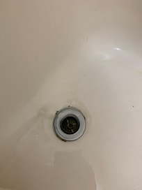 Plug hole in bathtub