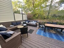 Lovely private outdoor seating to enjoy the fall leaves or summer breeze.