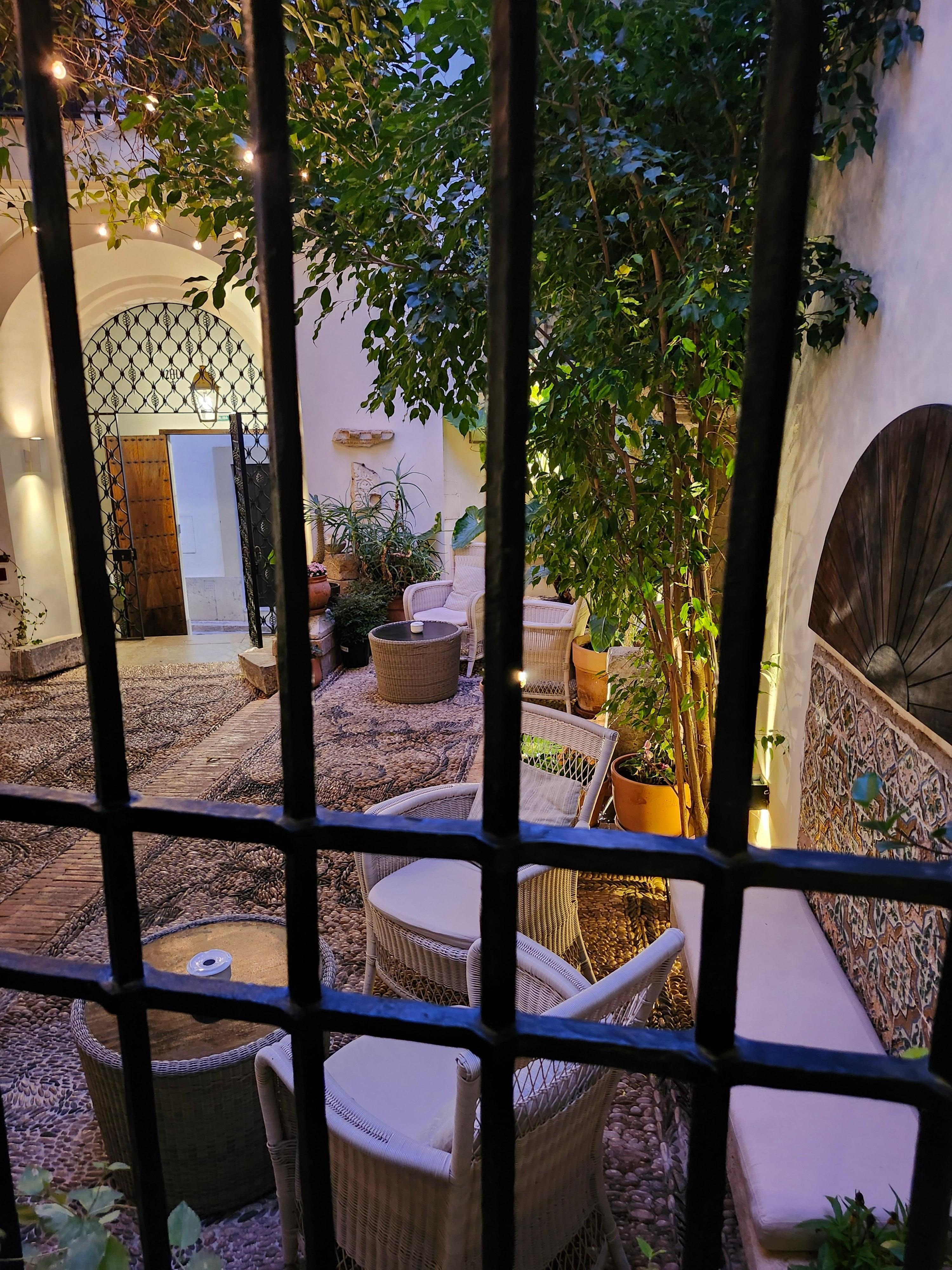 Room windie looking out to inner courtyard and dining area.