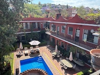 View of pool and rooms