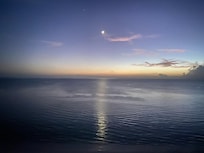 Moon reflection on the water from the balcony.