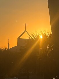Sunset behind one of three church steeples!