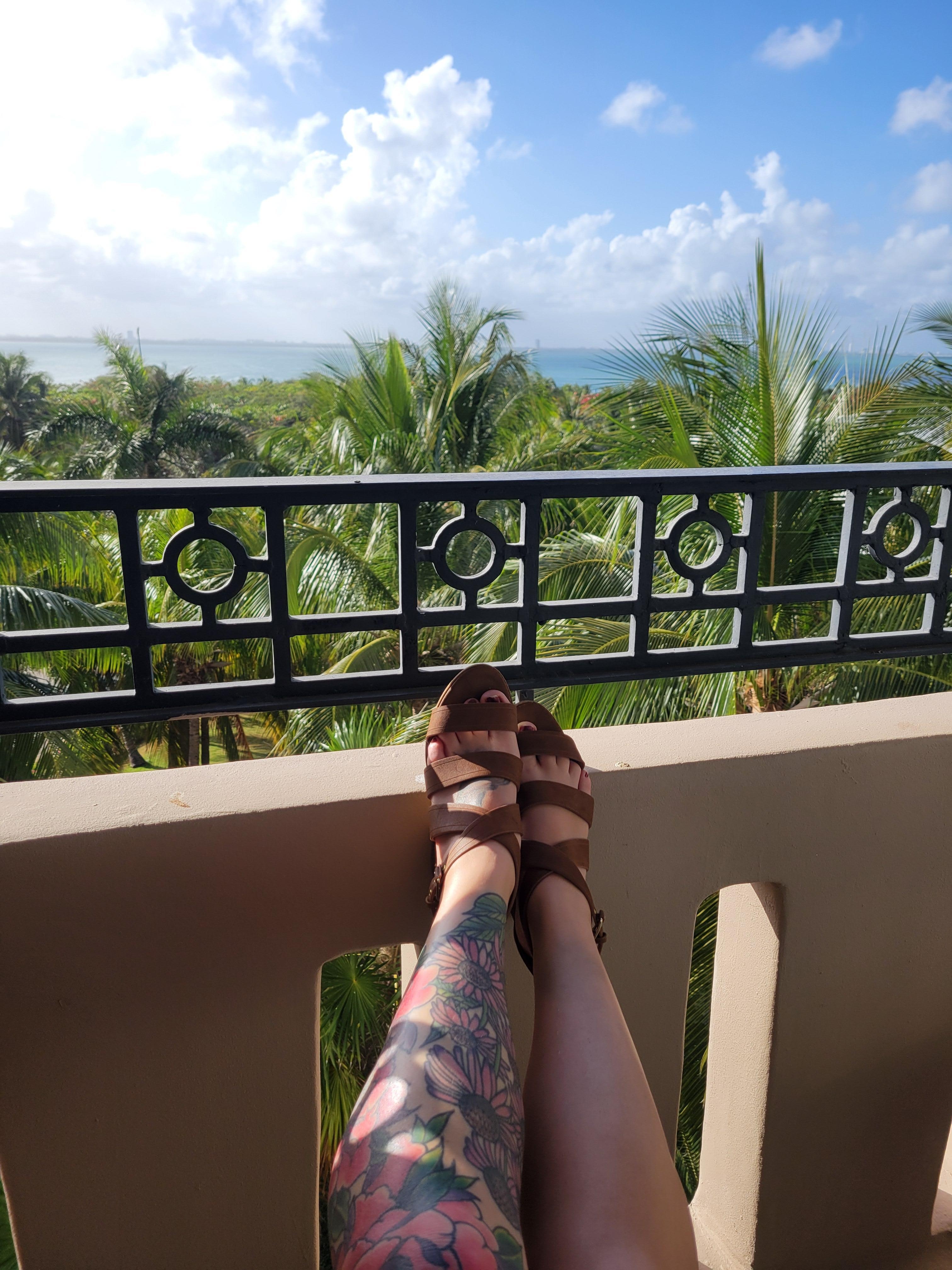 Balcony view in sunset room, sea tower