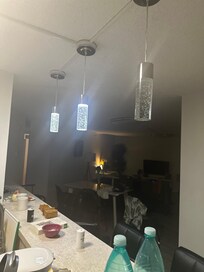 Burnt out kitchen light. You can’t see, but there was no towels. The provided sponge was used and should have been thrown out.