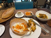 Egg hoppers and chicken curry