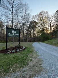 Church Farm sign at sunset