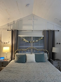 The first thing we saw when we opened the door. Look closely at the special detail on the wall over the bed
