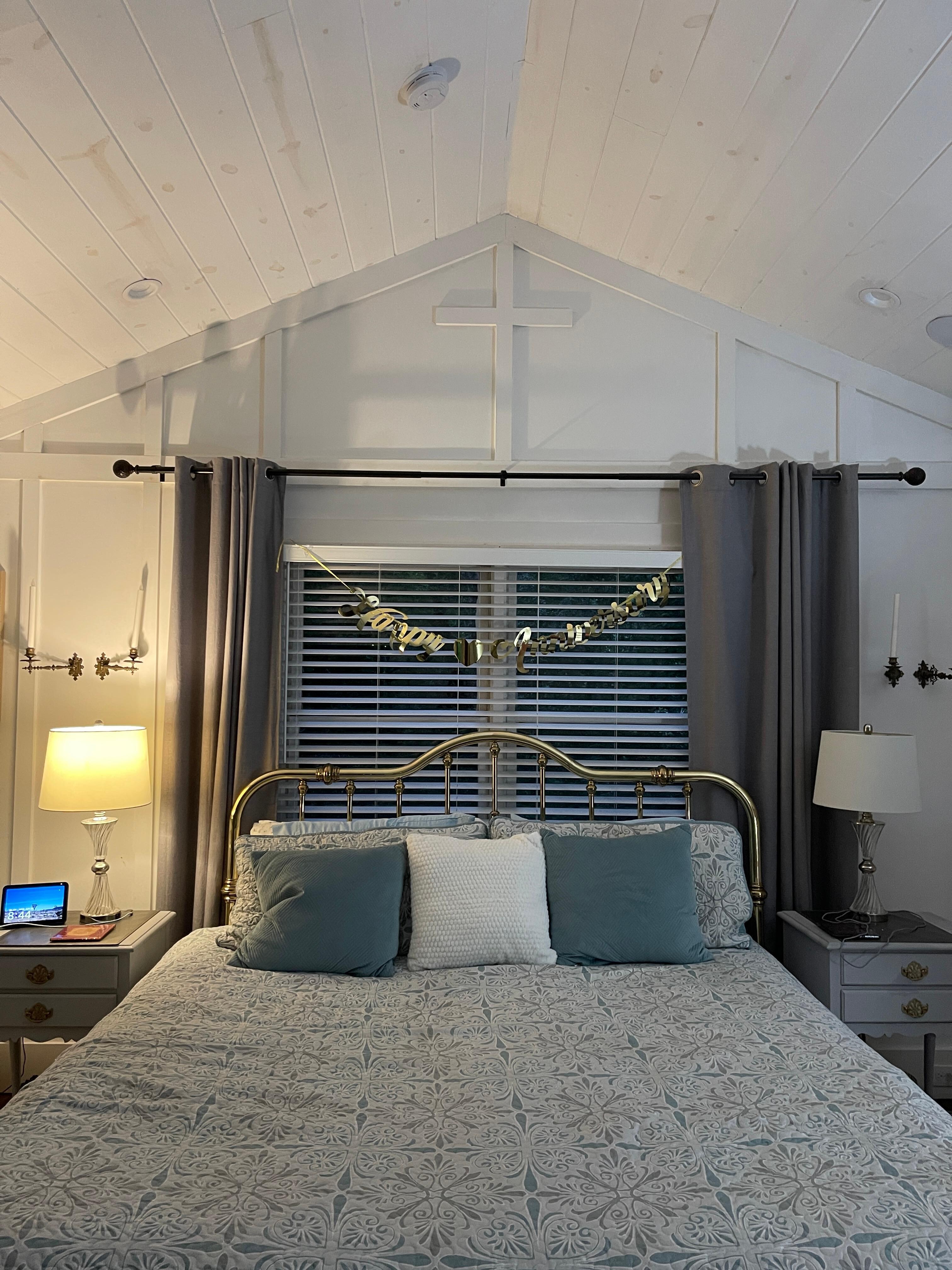 The first thing we saw when we opened the door. Look closely at the special detail on the wall over the bed 