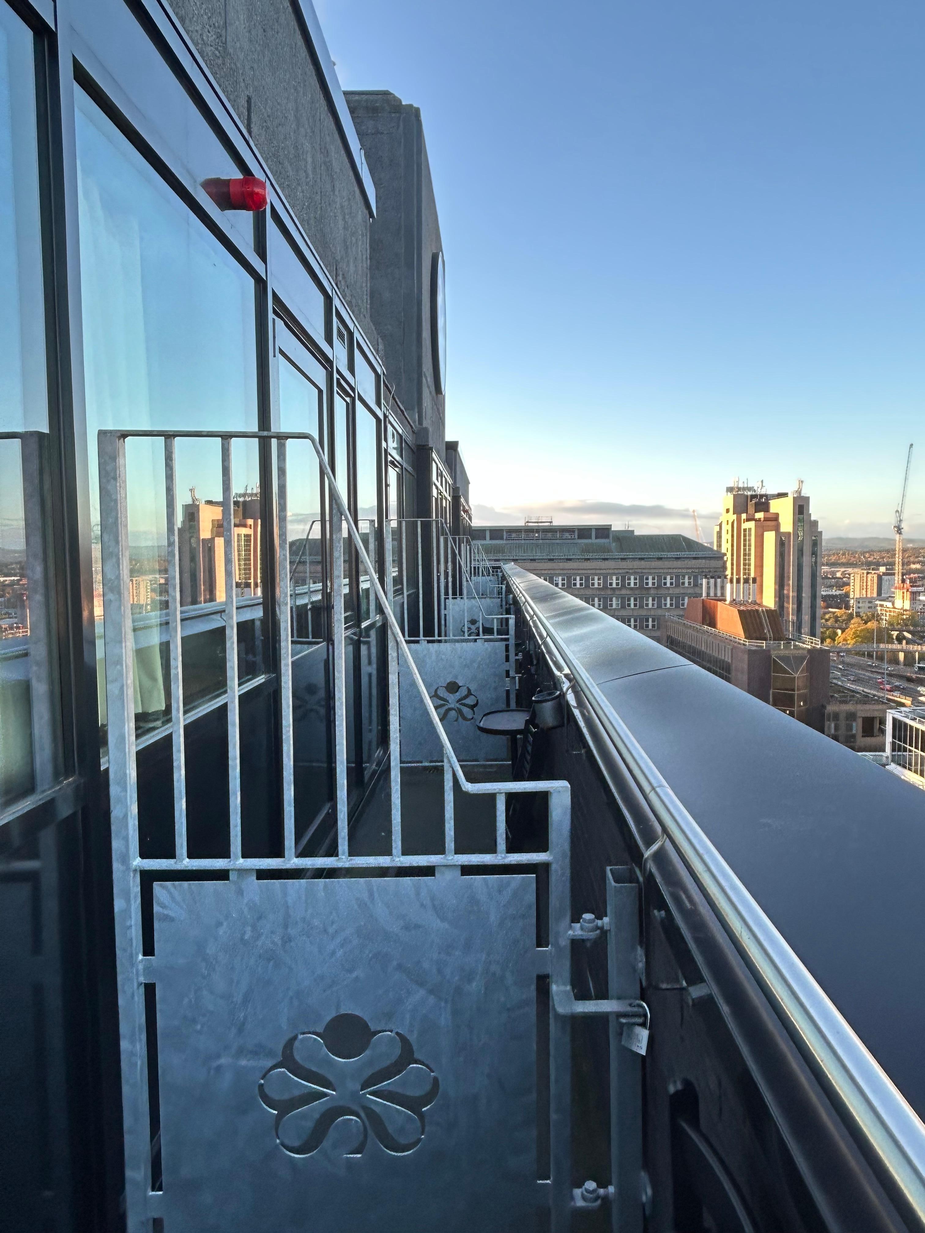 Looking along the side of the building at the balconies 