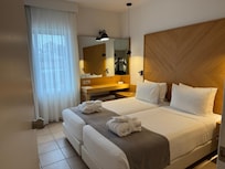 Junior suite bedroom. We were able to have the twin beds turned into a king.