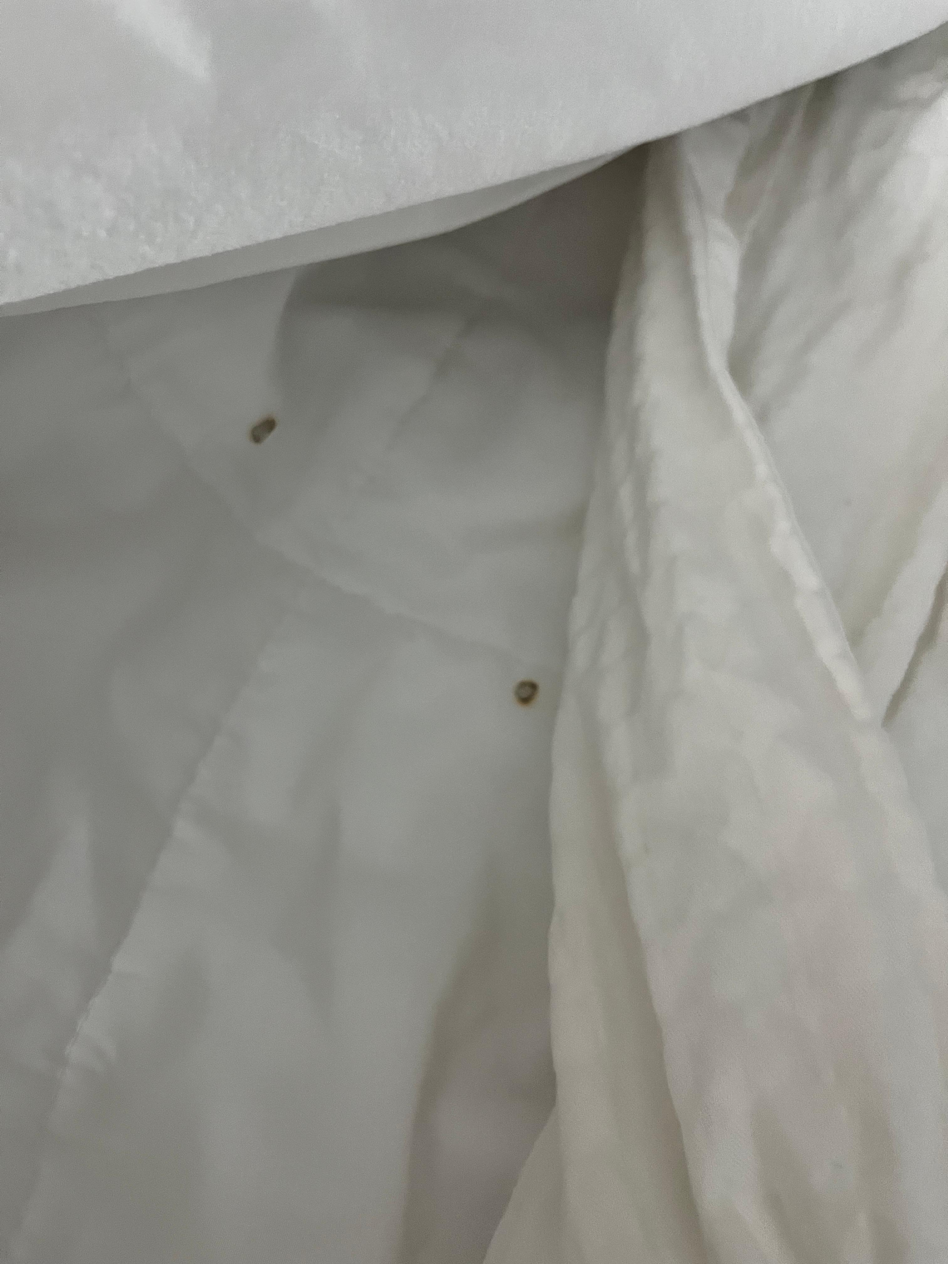 Bedding was either burned or had holes in it 