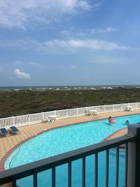 Pool and beach view from balcony