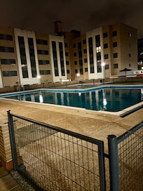 Pool area by night clearly