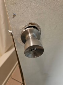 Door handle to bathroom was falling apart.
