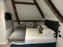 Very comfortable bed, under OLD beams.