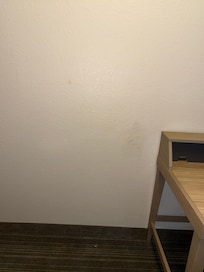 Wall behind room entrance door