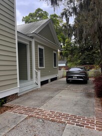 Back apartment that includes a small outdoor sitting space