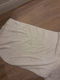 Plasters stuck to towel