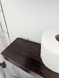 Broken shelf in bathroom