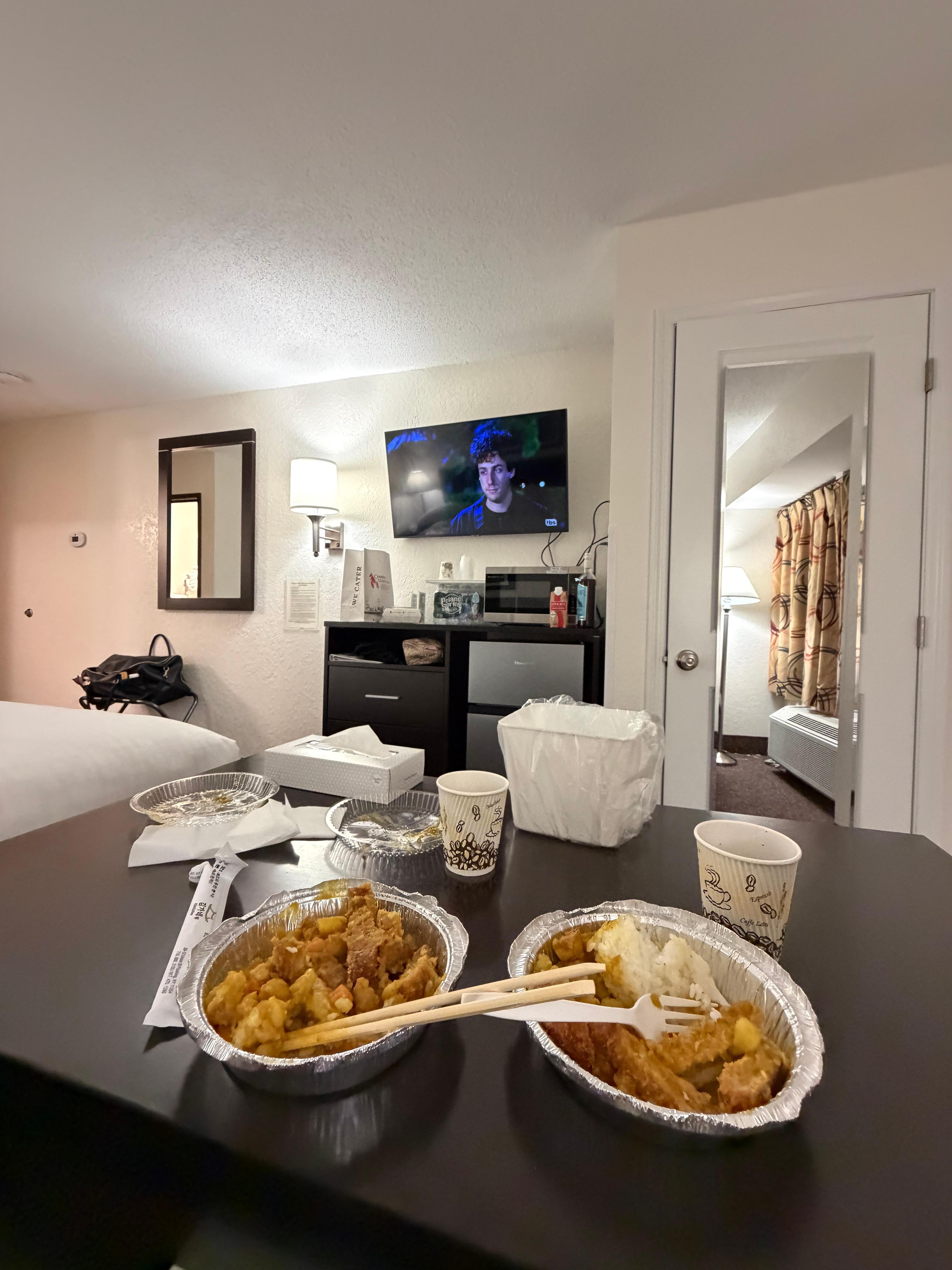A cable flat-screen TV is available, as well as a microwave and fridge inside the room.