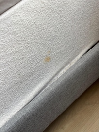 Stained bed sheet
