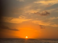 Sunset at Waikiki beach. Basically right downstairs from the hotel lobby.