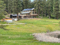 The lake, lodge and lawn.