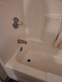 Dirty stained bathtud