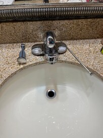 Disassembled sink left in repair
