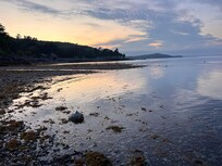 Sunset by the water at the hotel