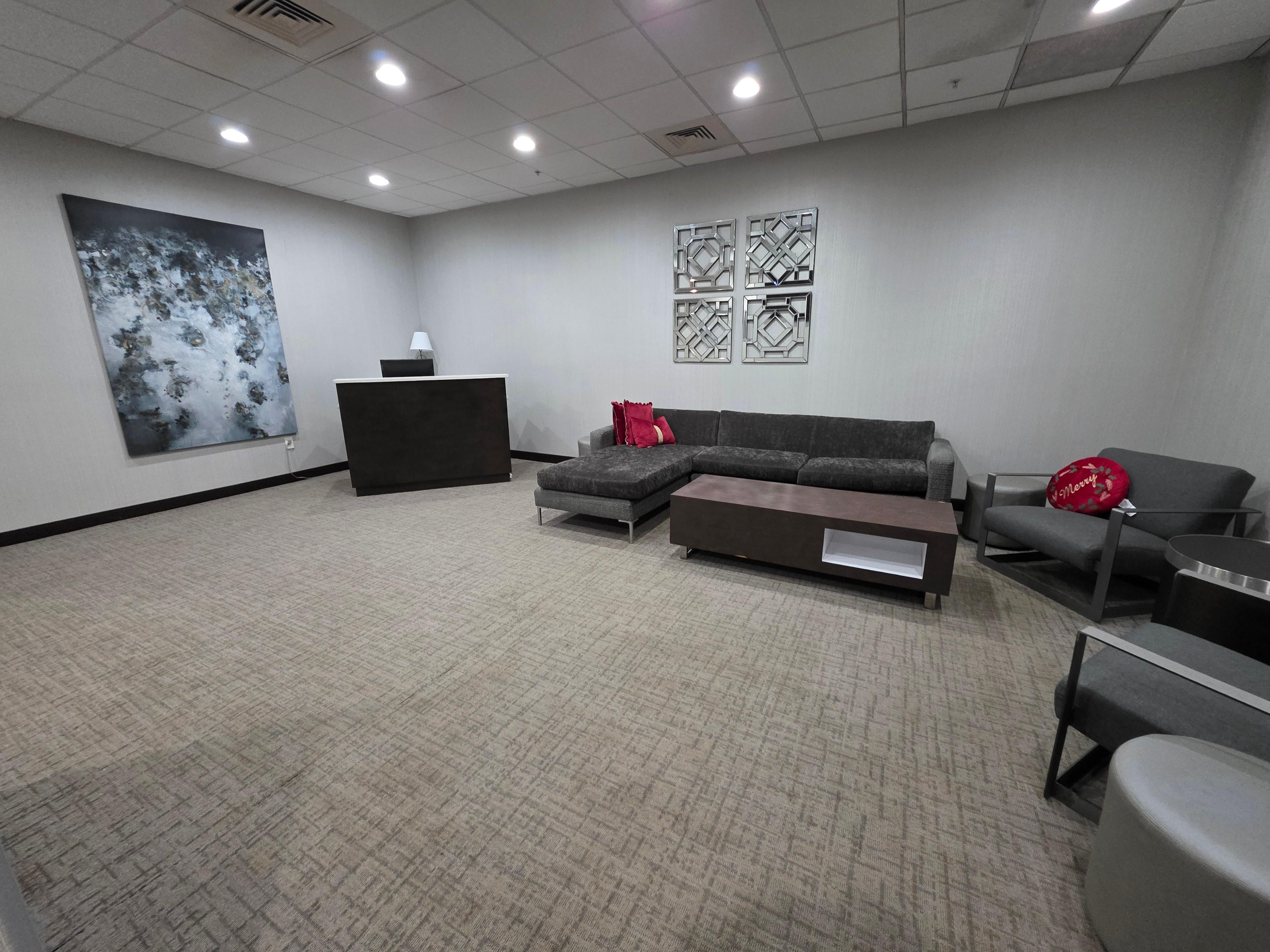 Cute waiting areas with a guest computer. 