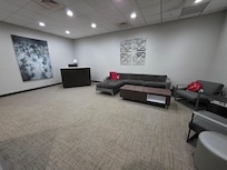 Cute waiting areas with a guest computer.