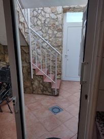 Stairs leading to the roof-top patio
