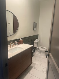 Bathroom to the right of entrance