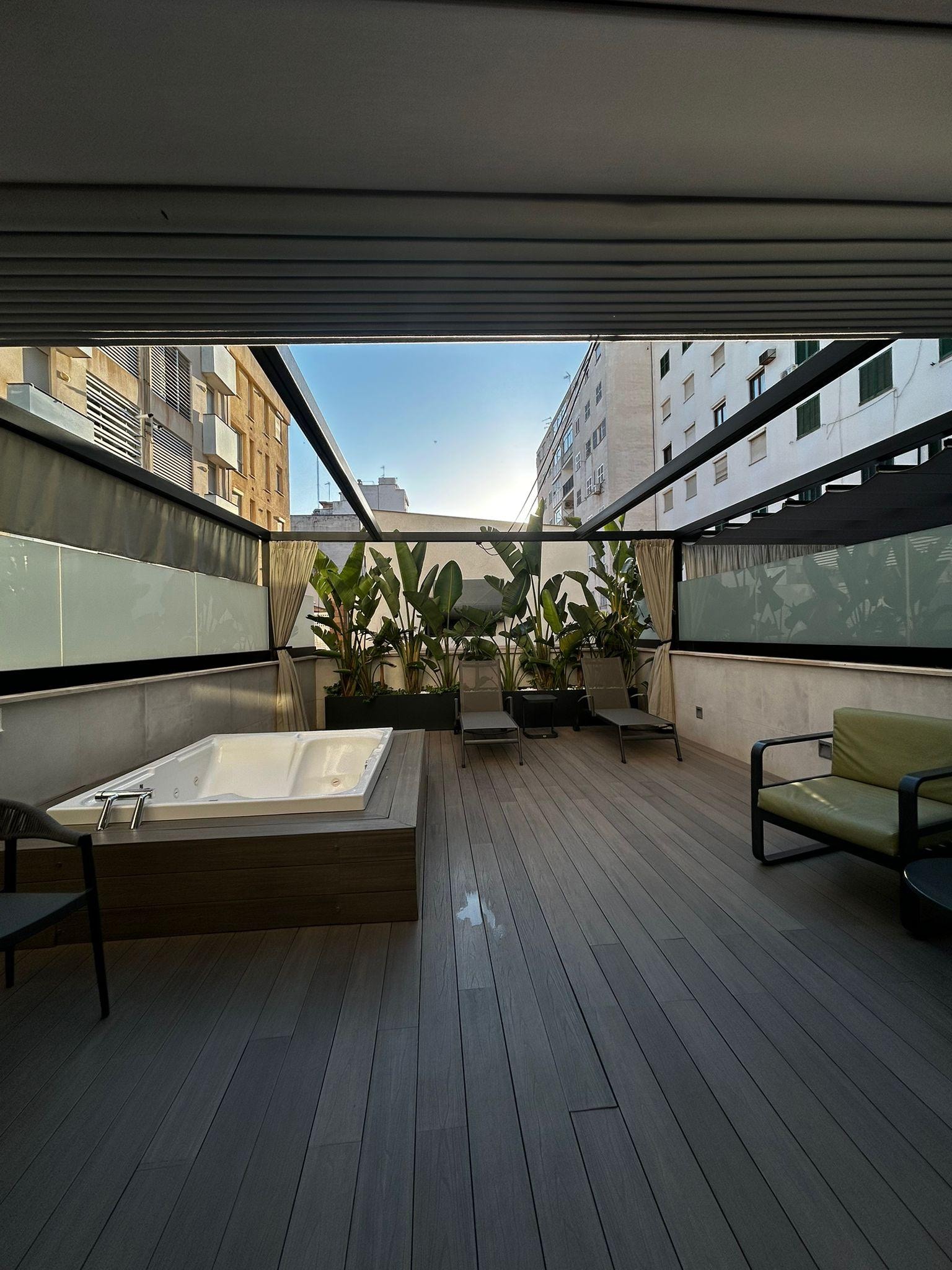 Patio with jacuzzi.