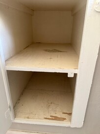 Inside of the primary bathroom cabinet.
