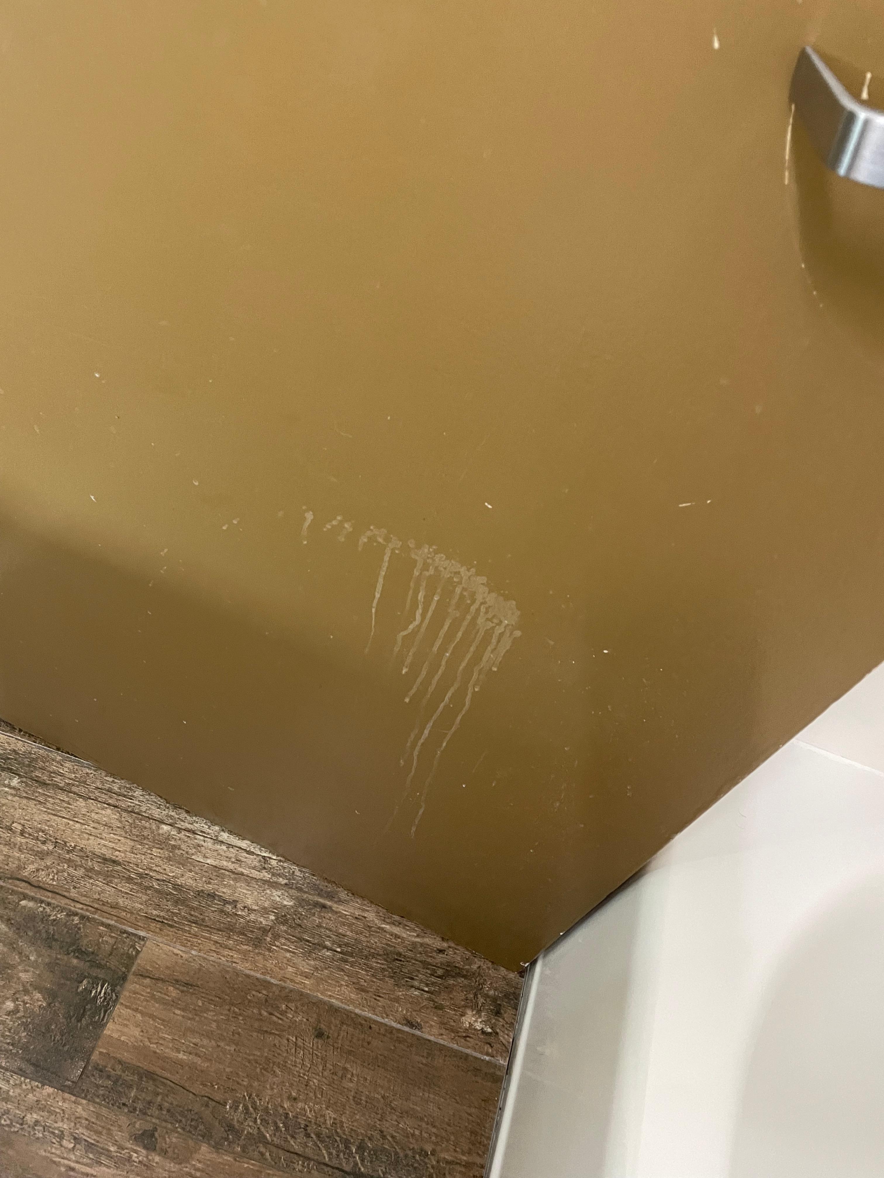 White goo sprayed on door