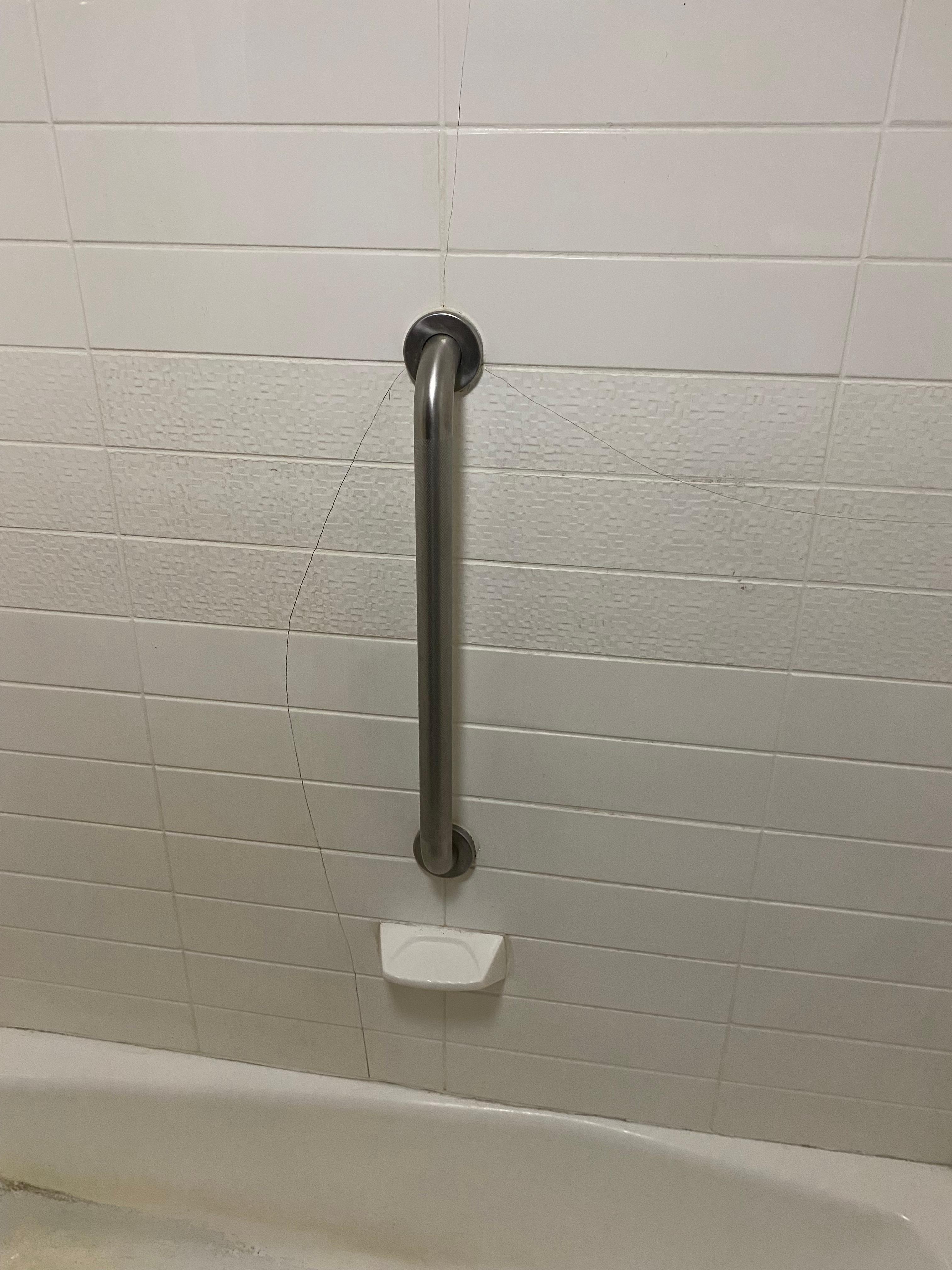 Broken shower wall