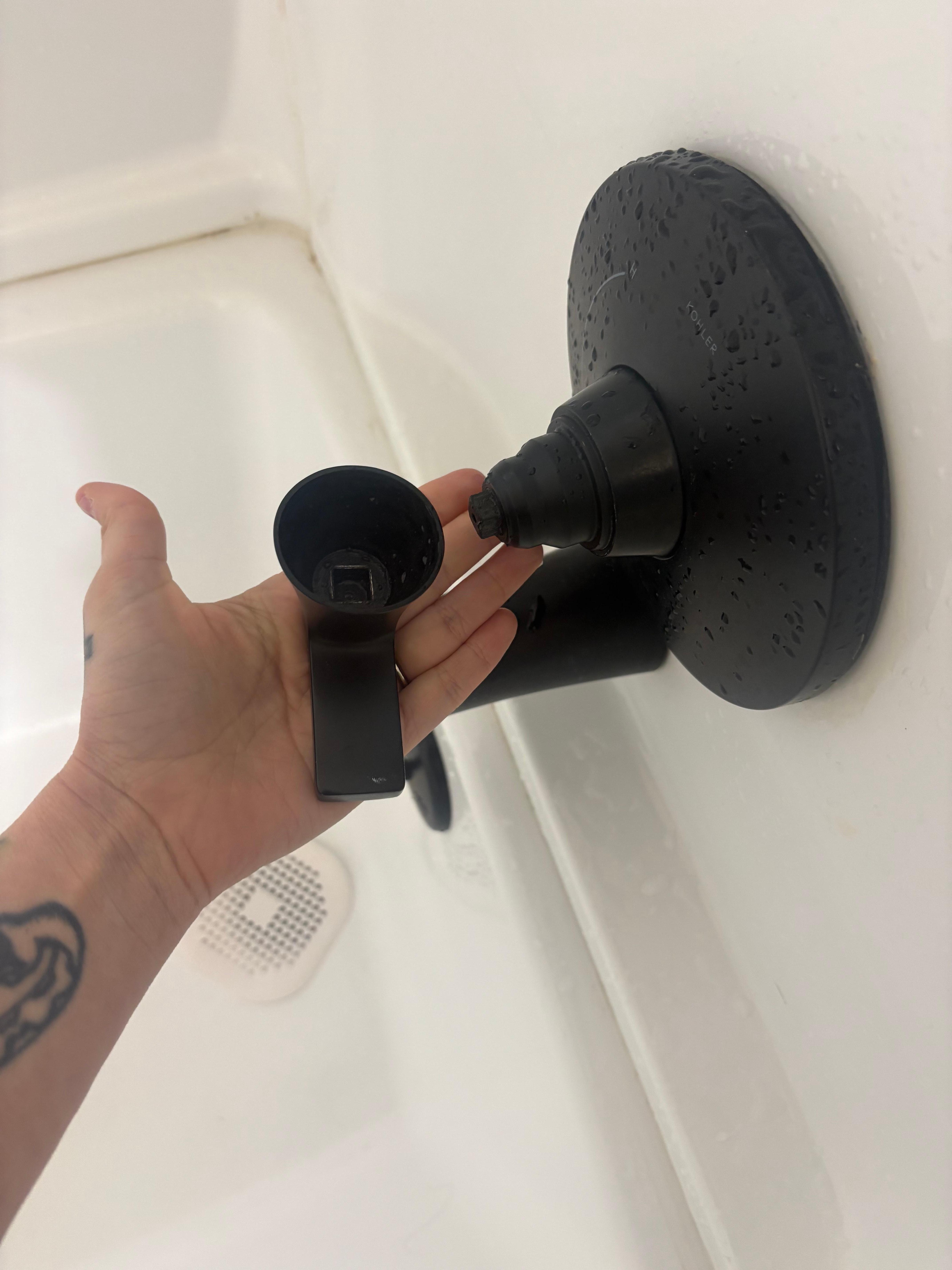 Broken shower handle . Difficult to turn tub water to shower