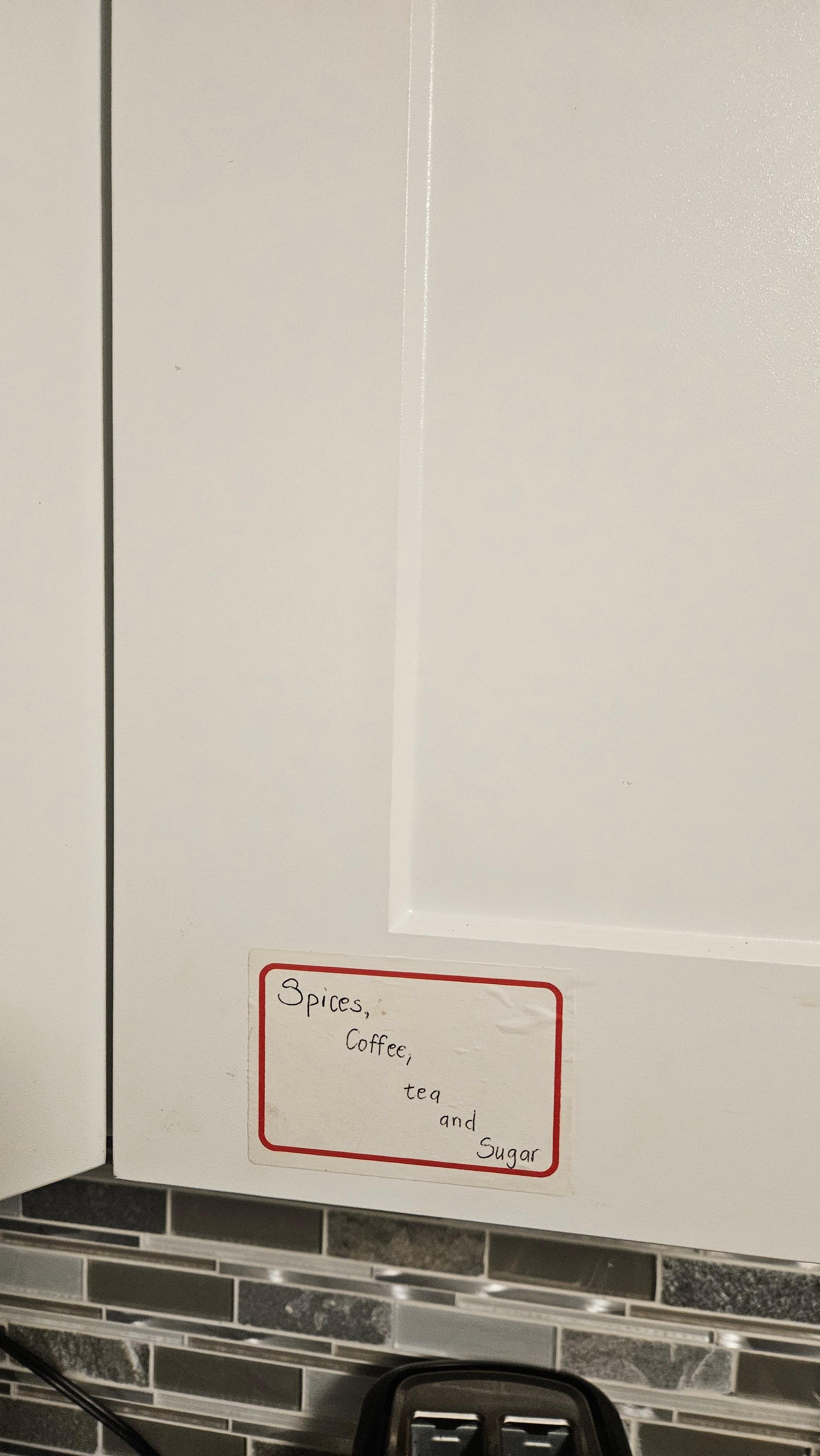 Description on outside of cupboard