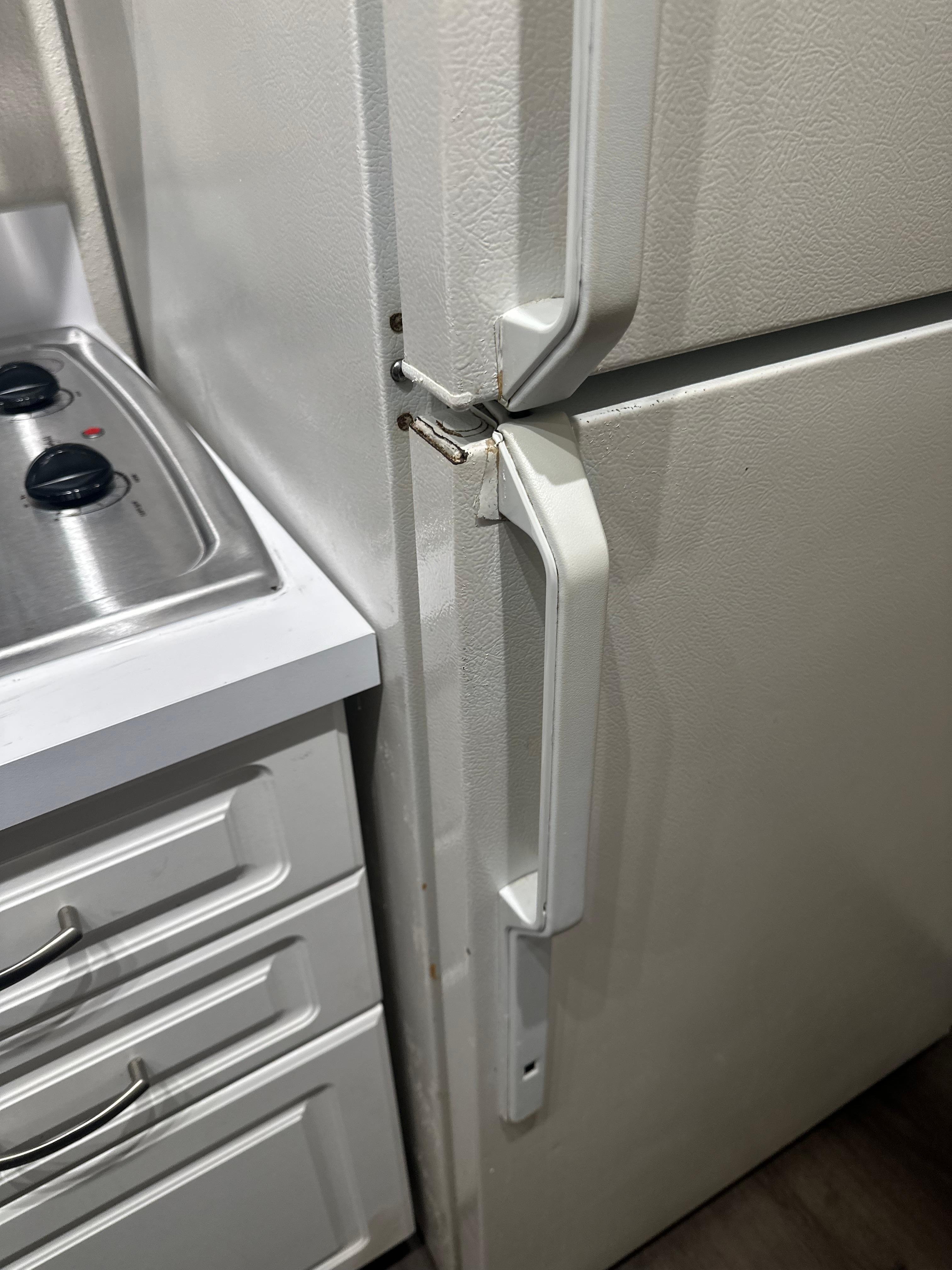 Food stains on the counter and fridge