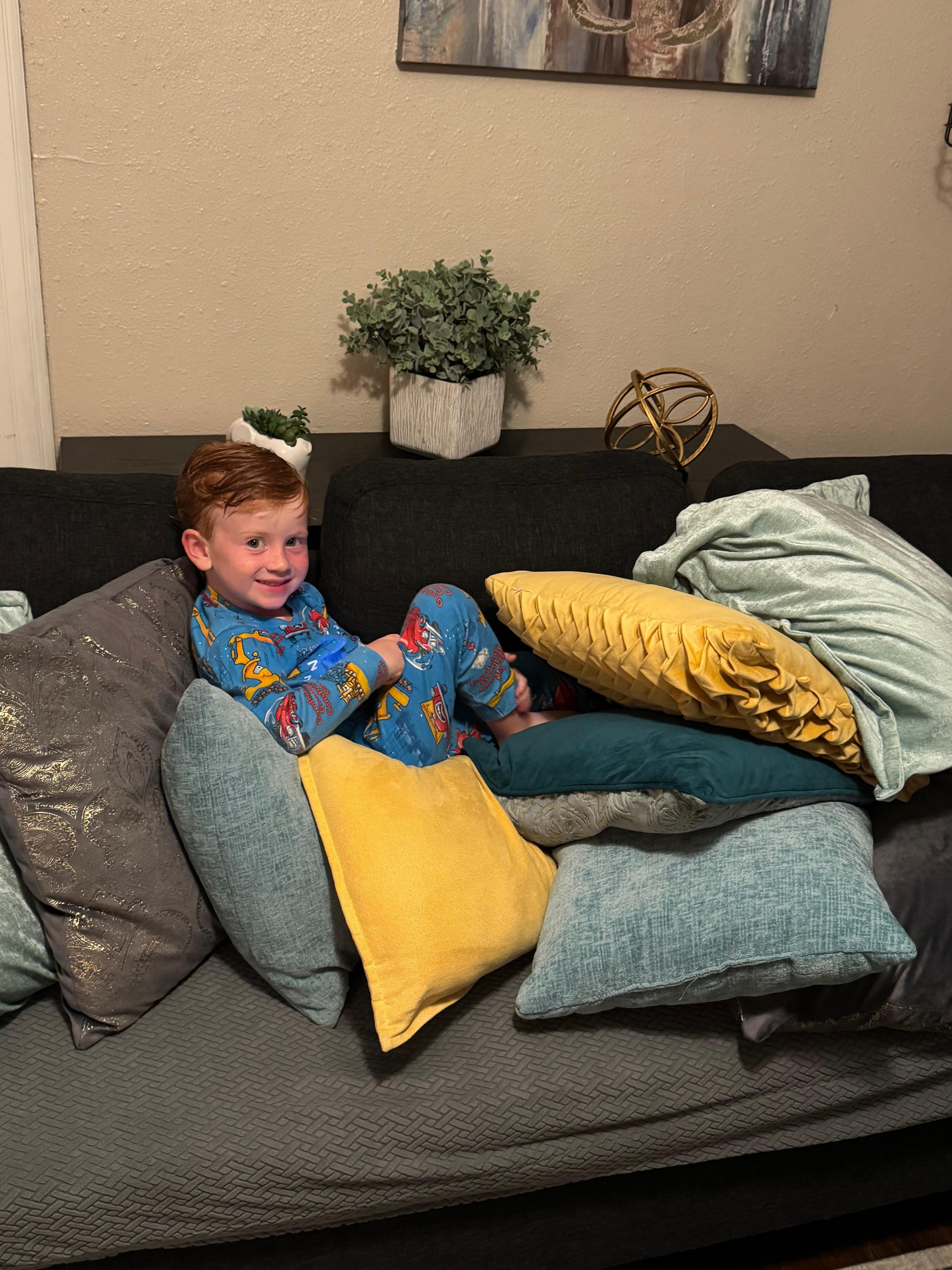 A couch full of pillows is perfrct